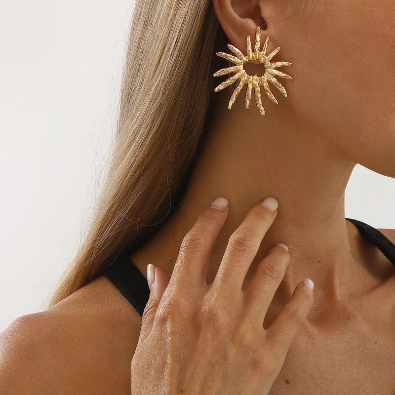 SunCharm – עגילי שמש גאומטריים