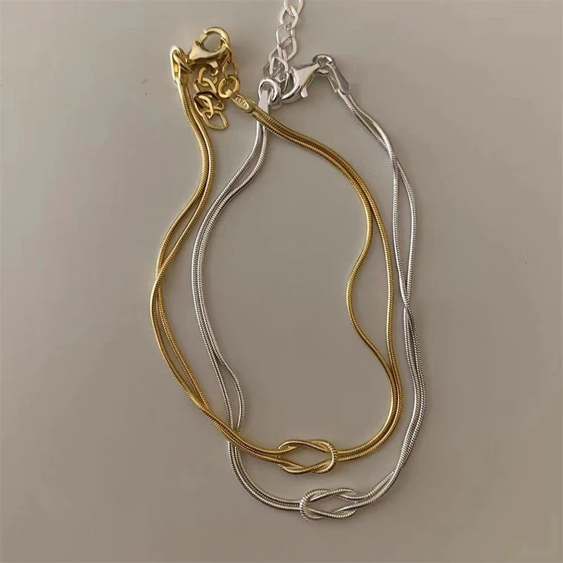 TwinHook – צמיד שרשרת כפול בעיצוב מודרני