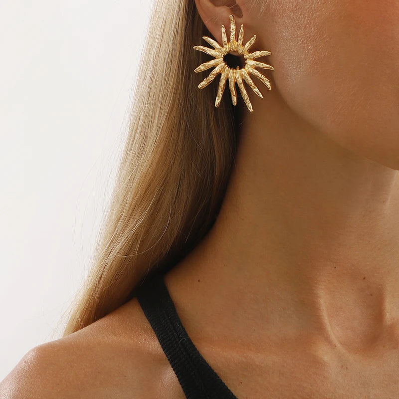 SunCharm – עגילי שמש גאומטריים