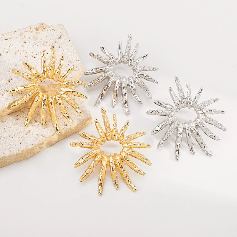 SunCharm – עגילי שמש גאומטריים