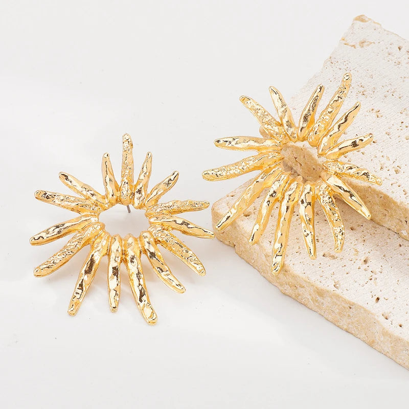 SunCharm – עגילי שמש גאומטריים