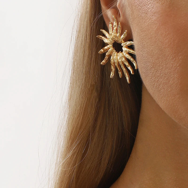 SunCharm – עגילי שמש גאומטריים