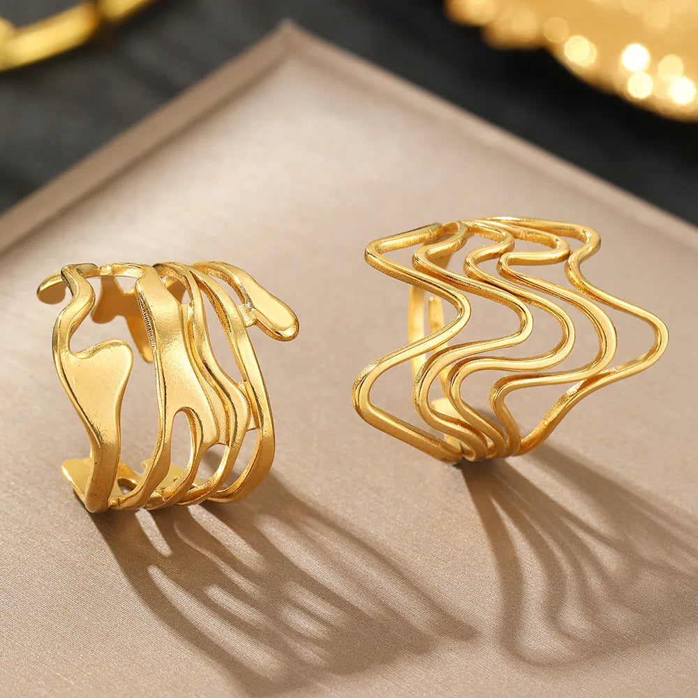 GeoPulse – טבעת גאומטרית פתוחה מנירוסטה וטיטניום