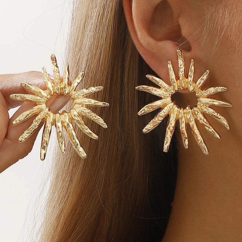 SunCharm – עגילי שמש גאומטריים