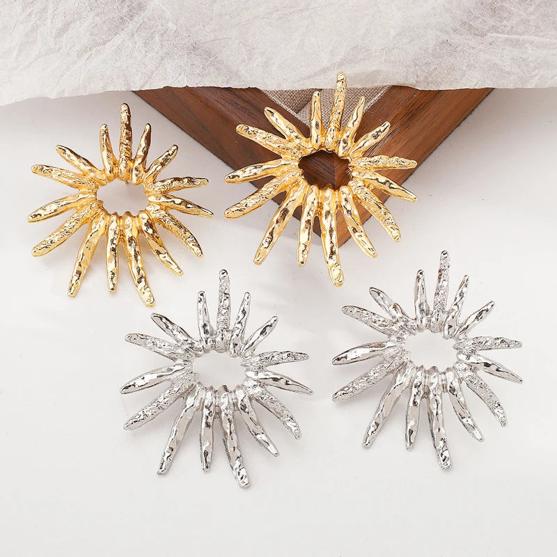 SunCharm – עגילי שמש גאומטריים